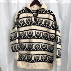 100% Wool bulky knit pullover collared sweater. Hand made in Equador.